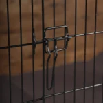 Close-up of heavy-duty iron hardware and secure lock on theShaper wooden dog crate.