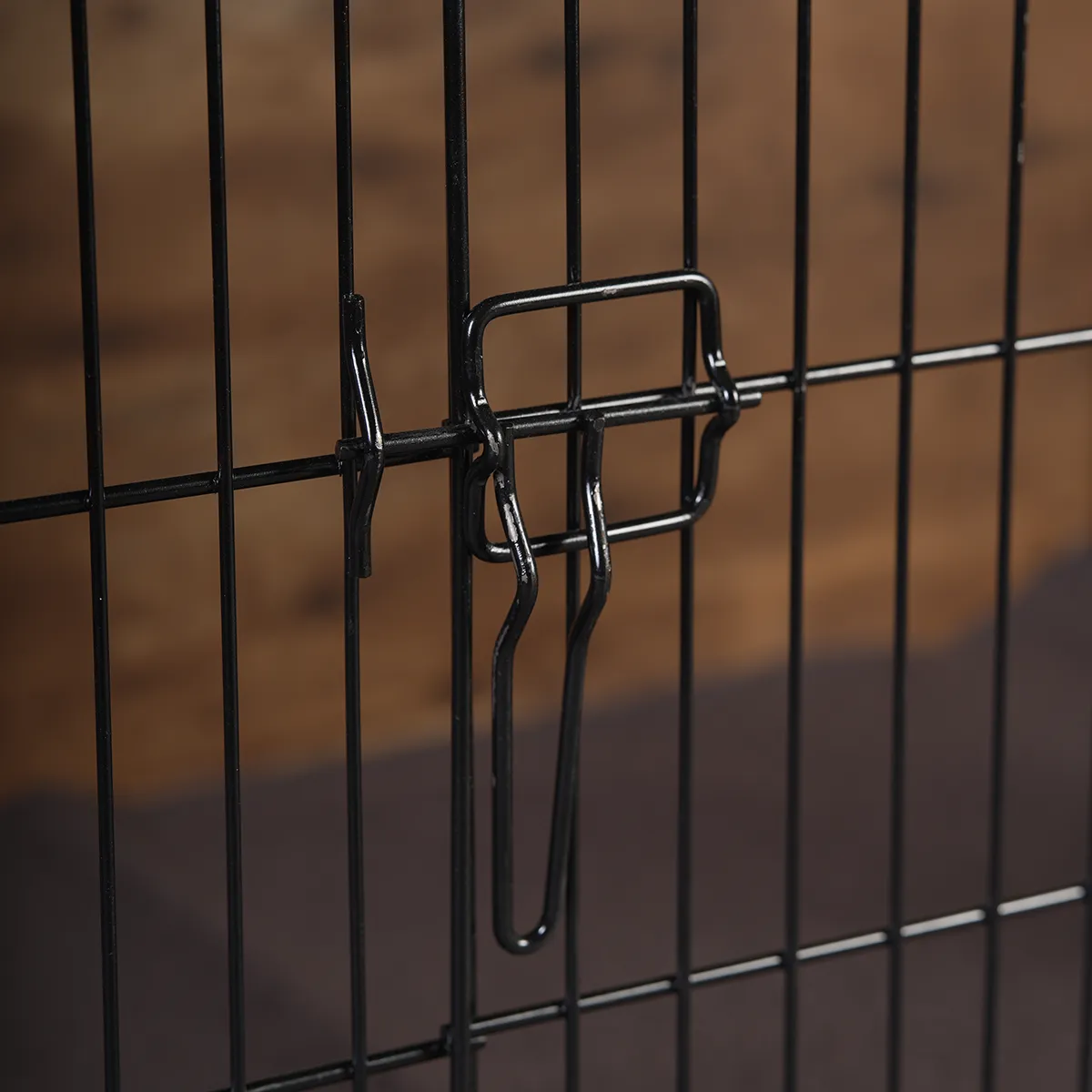 Close-up of heavy-duty iron hardware and secure lock on theShaper wooden dog crate.
