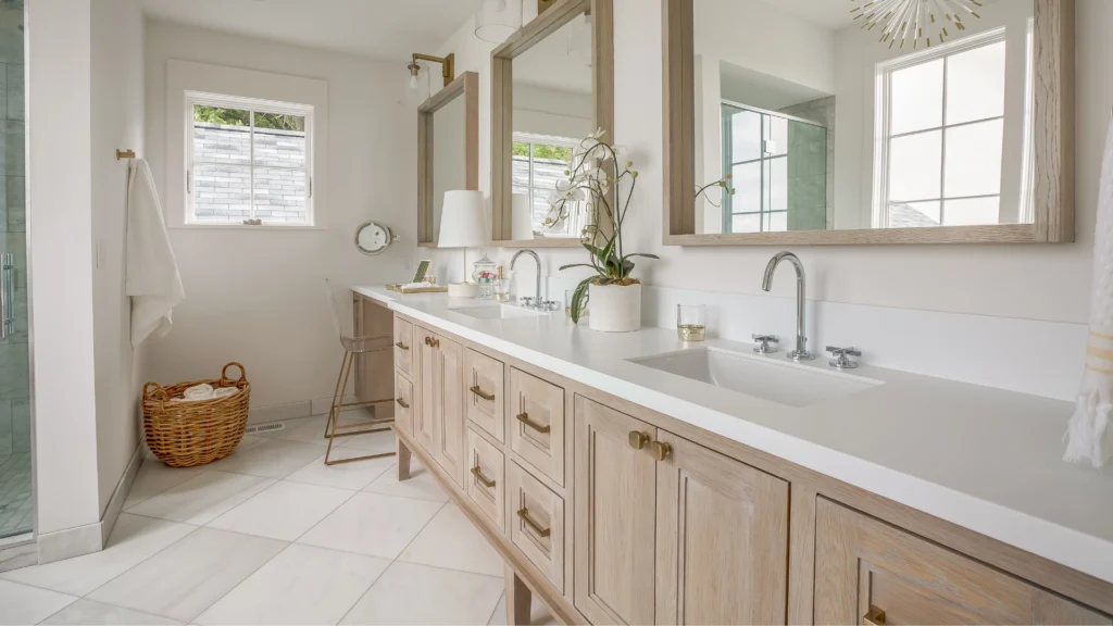 A completed modern wood-grain double bathroom vanity with black metal bases and integrated double sinks