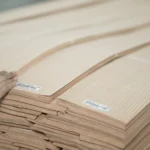 Quality control team sorting and grading AAA premium grade white oak veneer sheets
