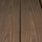 A complete single bundle of natural American Black Walnut crown cut veneer sheets showing consistent grain sequence.