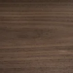 High-resolution surface texture of Crown Cut American Black Walnut wood veneer by theShaper, showing fine fiber and natural wood grain details.