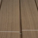Symmetrical Rift Cut American Black Walnut veneer bundles by theShaper, showing aligned, tight linear grain.