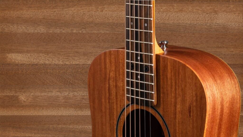 Close-up of acoustic guitar back and side made with Kim Cu Thai Sapele veneer and premium layered construction by theShaper selected factory.