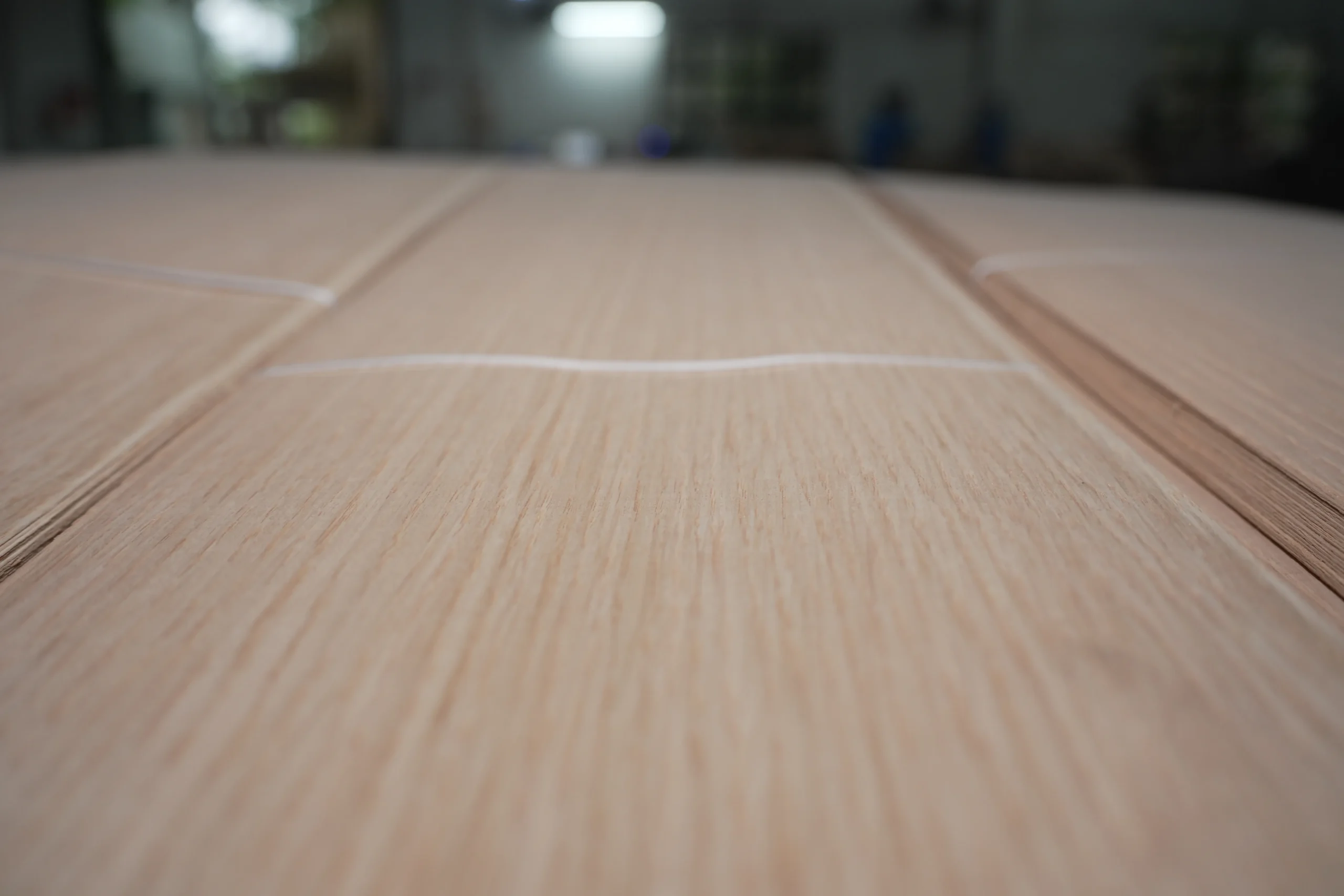 Rift cut cabinetry grade white oak veneer sheets with consistent straight grain patterns