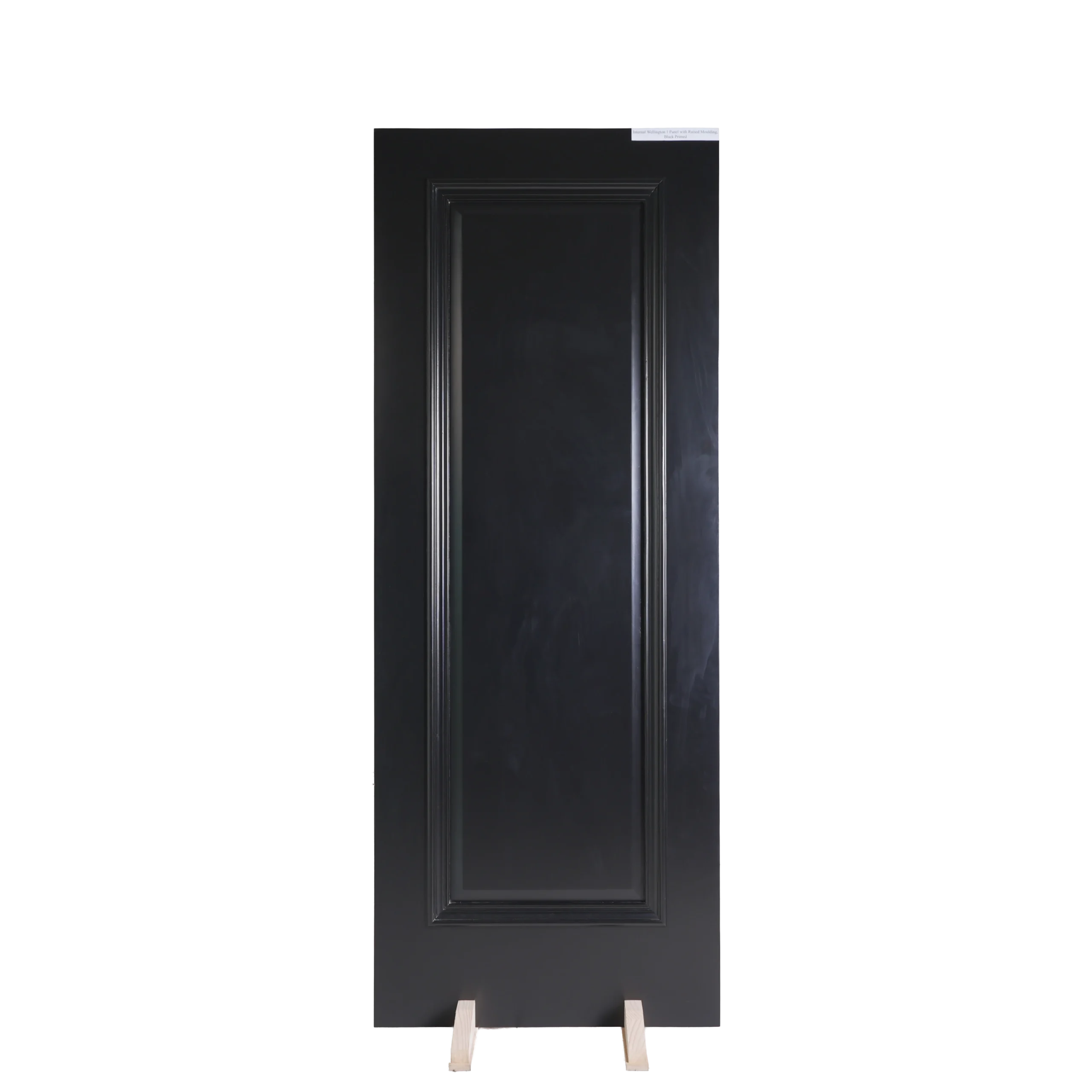 Front view of a Raised Panel Matt Black composited wood cabinet door featuring a smooth matte finish and traditional raised center panel architecture.