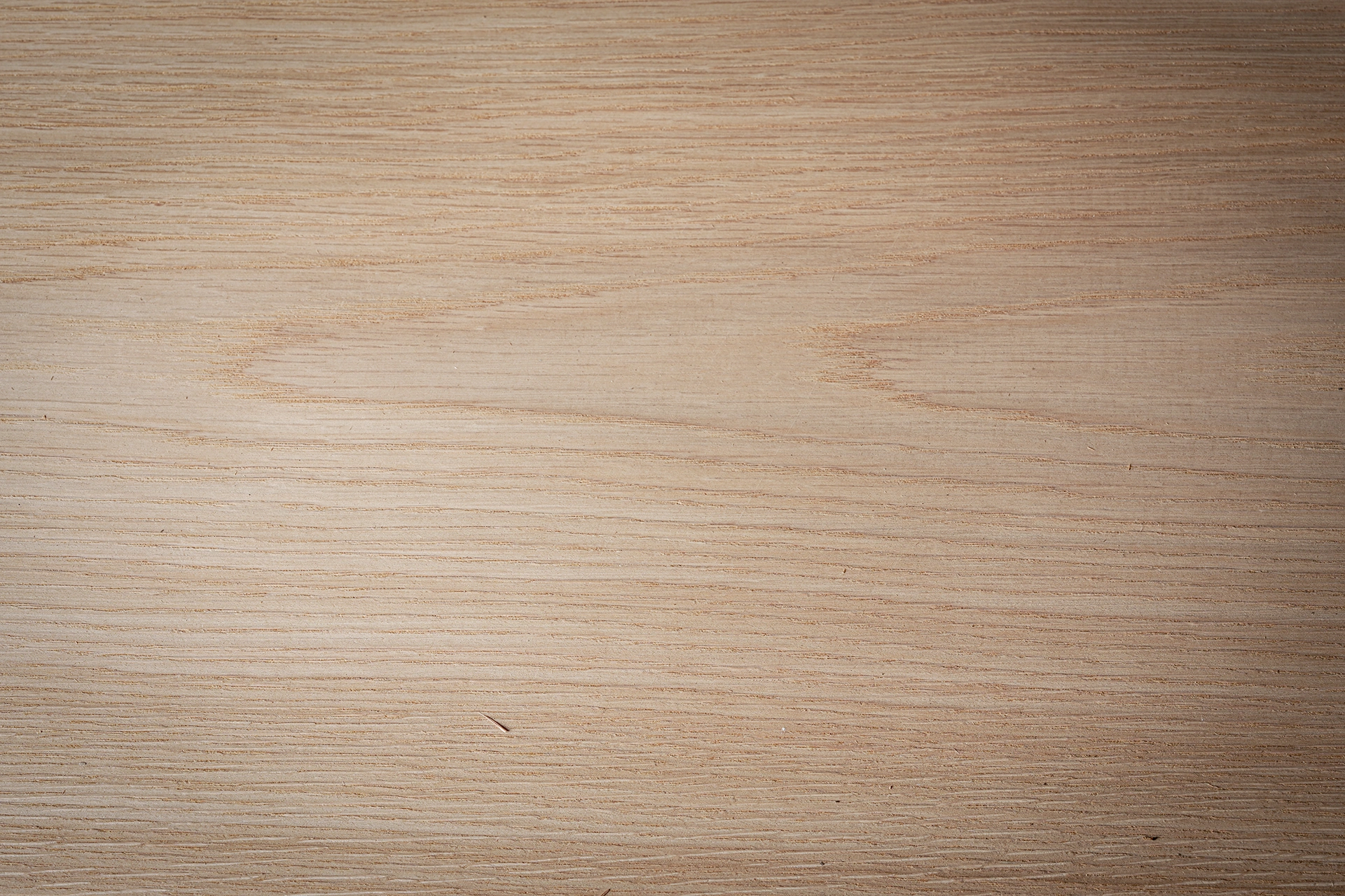 Alternate close-up angle displaying the book-matched cathedral grain alignment of White Oak Crown Cut Veneer from theShaper.