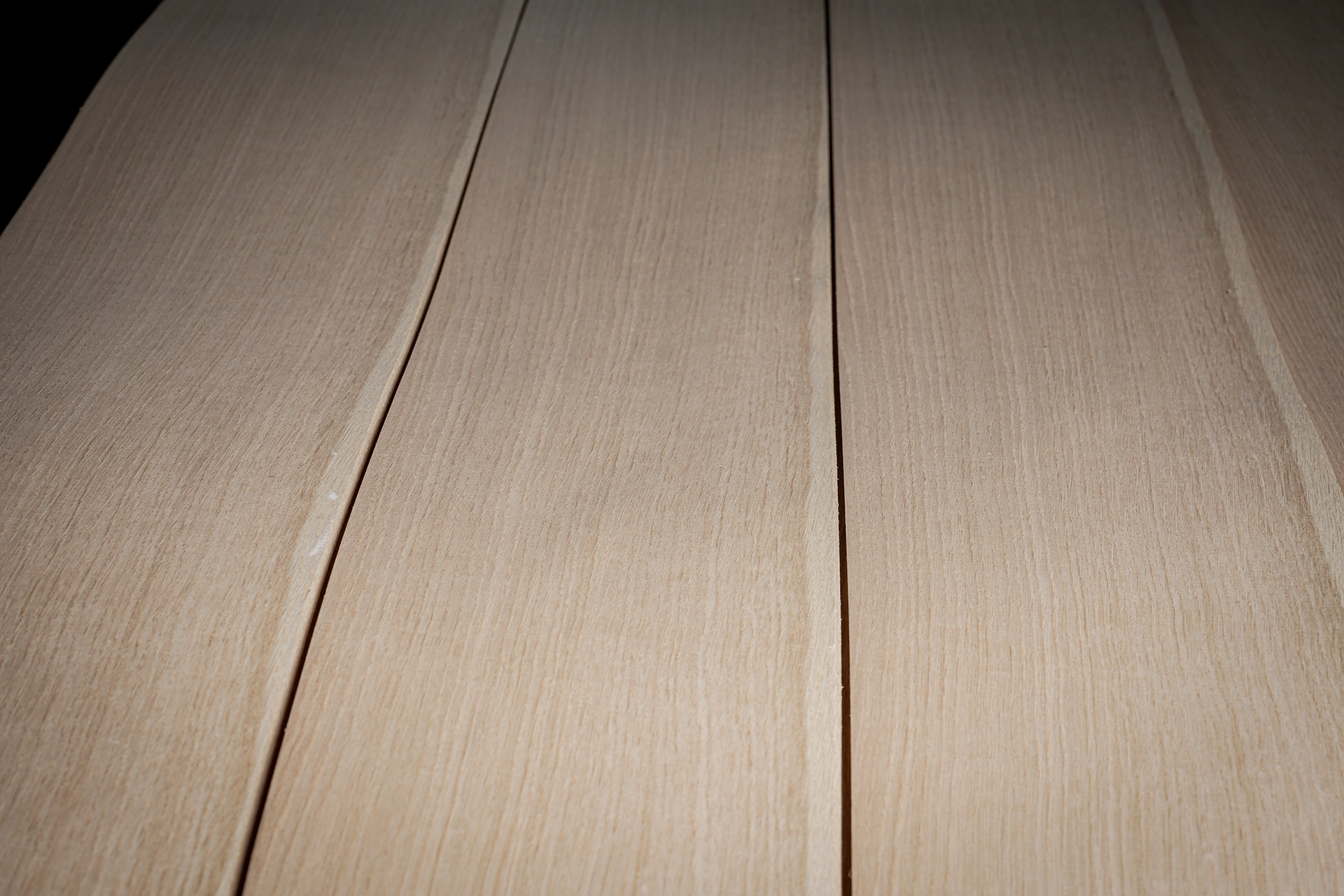 Elegant vertical straight grain texture of Cabinet Grade American White Oak Rift Cut Veneer for premium cabinetry by theShaper.