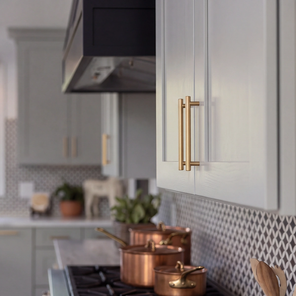 Close-up shot of theShaper Light French Gray framed wall cabinet highlighting the flawless paint finish and precise Shaker door joinery. 1:1