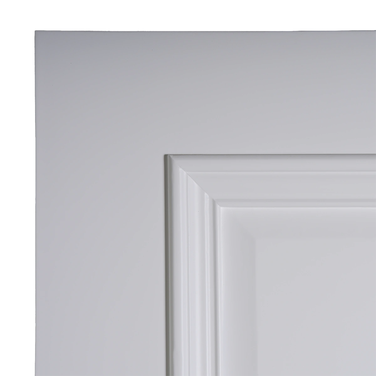 Macro view of the White Raised Panel composited wood door profile showing the crisp inner corners and flawless lacquer coat thickness.