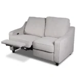 Fabric power loveseat at 30-degree angle with left seat reclined and right seat upright.