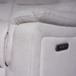 Close-up of side power control buttons with integrated fast-charging USB port.