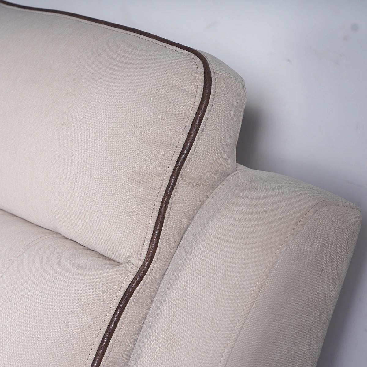 Close-up of plush segmented backrest cushion providing cervical and lumbar support.