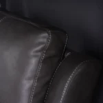 Close-up of channeled ergonomic backrest cushion providing lumbar and thoracic support.