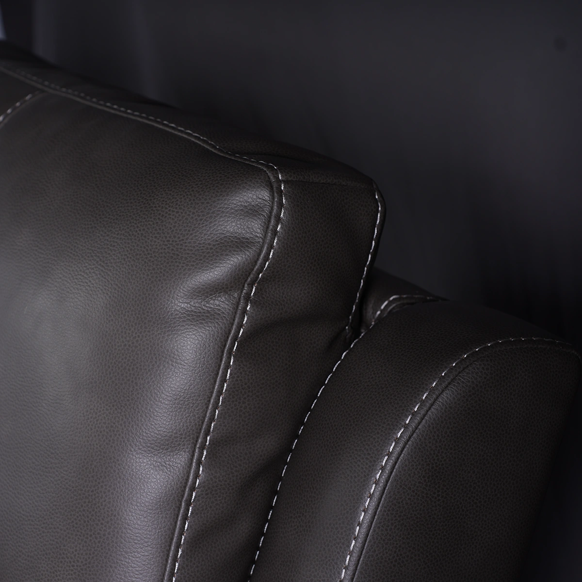Close-up of channeled ergonomic backrest cushion providing lumbar and thoracic support.