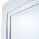 Close-up of projecting bolection moulding shadow lines under directional lighting in Dover White