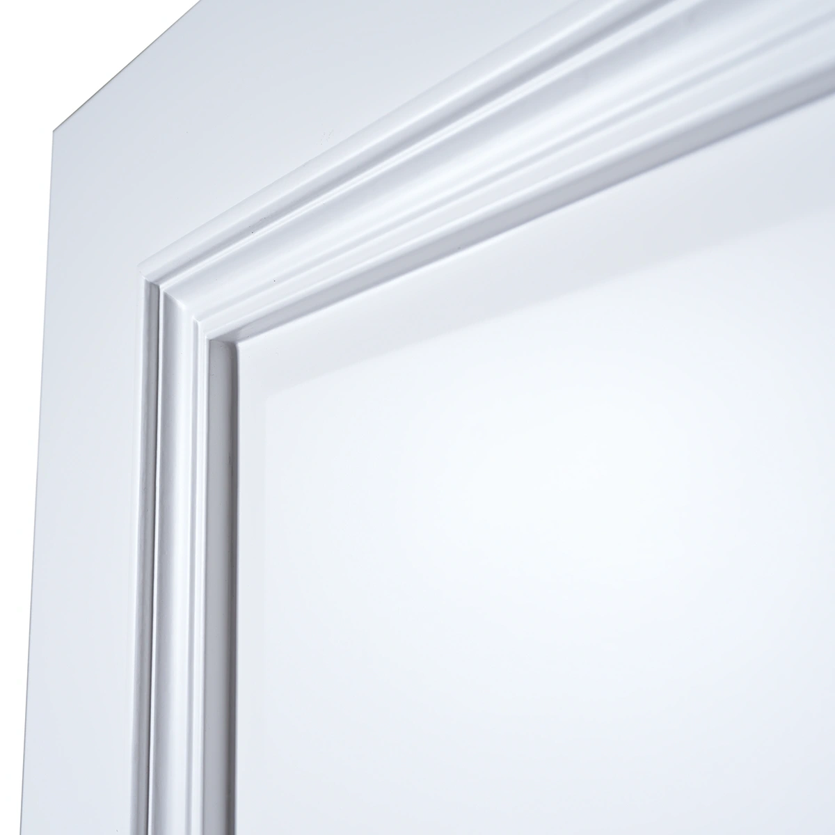 Close-up of projecting bolection moulding shadow lines under directional lighting in Dover White