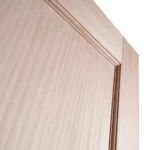 Close-up texture of solid pine natural growth rings and contoured raised panel field