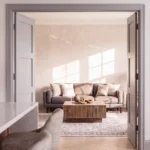 Classic Equal 3-Panel Shaker double interior doors shown wide open connecting master suite and study