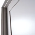 Upper rail and head jamb alignment detail of Equal 3-Panel Shaker double doors in Zurich White