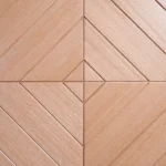 Macro close-up of center quad-veneer intersection seam on Diamond-Matched Oak door