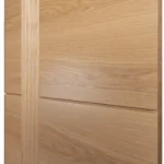 Close-up of vertical reeded flutes transitioning into smooth Nordic Oak veneer panel