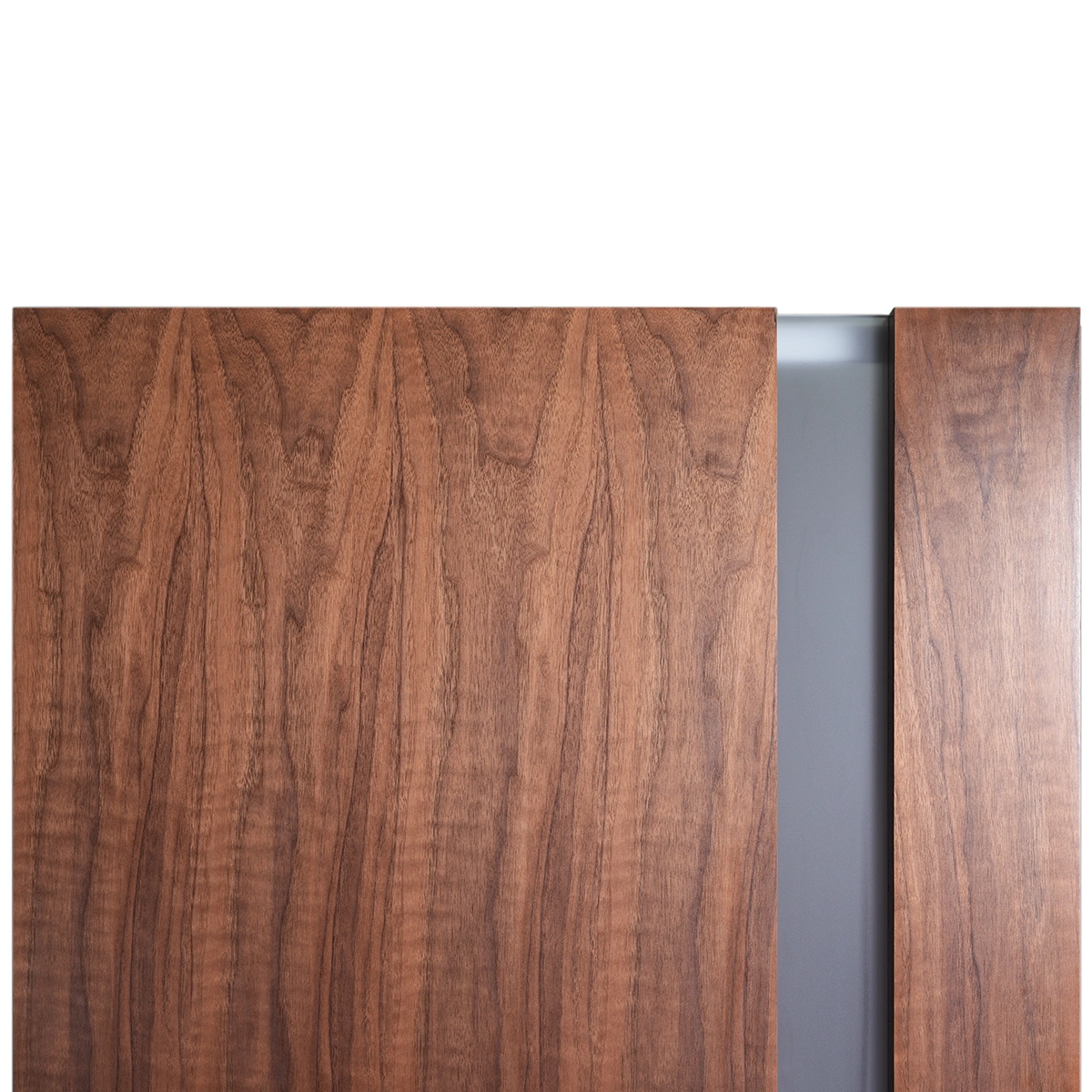 Upper rail joint detail of Full-Height Offset 1-Lite door in Heritage Smoked Walnut