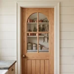 Modern Roman Arch 4-Lite Planked interior door installed in an upscale transitional living space