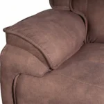 Close-up of deep-padded pillow-top armrest showing tailored heavy-duty stitching and distressed faux leather grain.