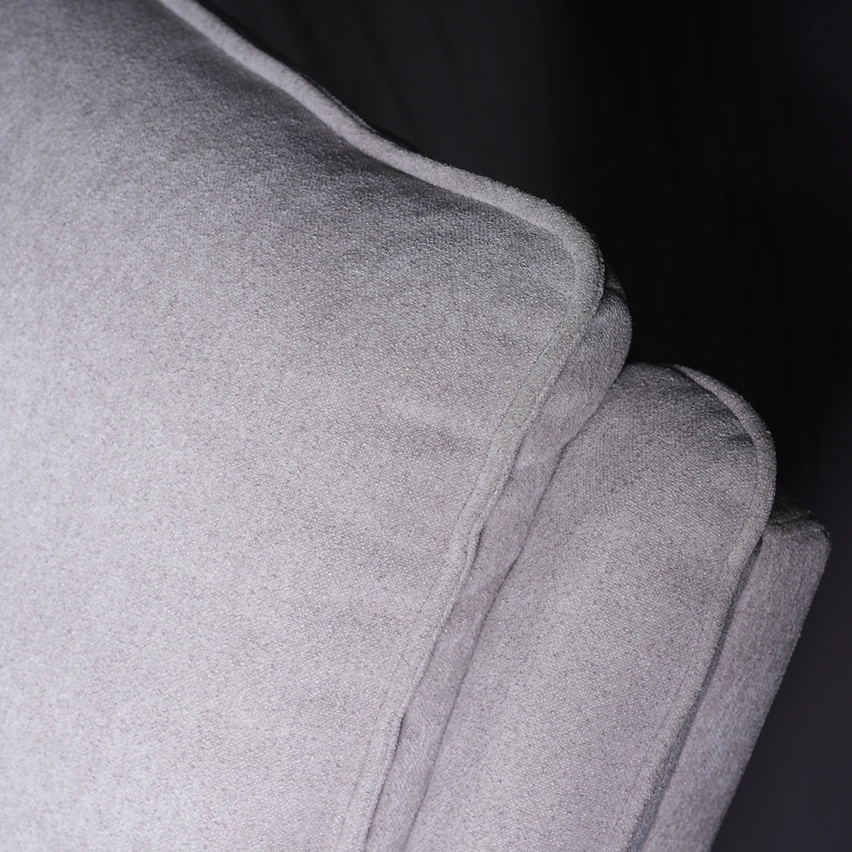 Close-up of ergonomic backrest showing breathable, anti-pilling heavyweight woven fabric texture.