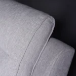 Close-up of ergonomic tiered channel backrest showing segmented lumbar and neck support.
